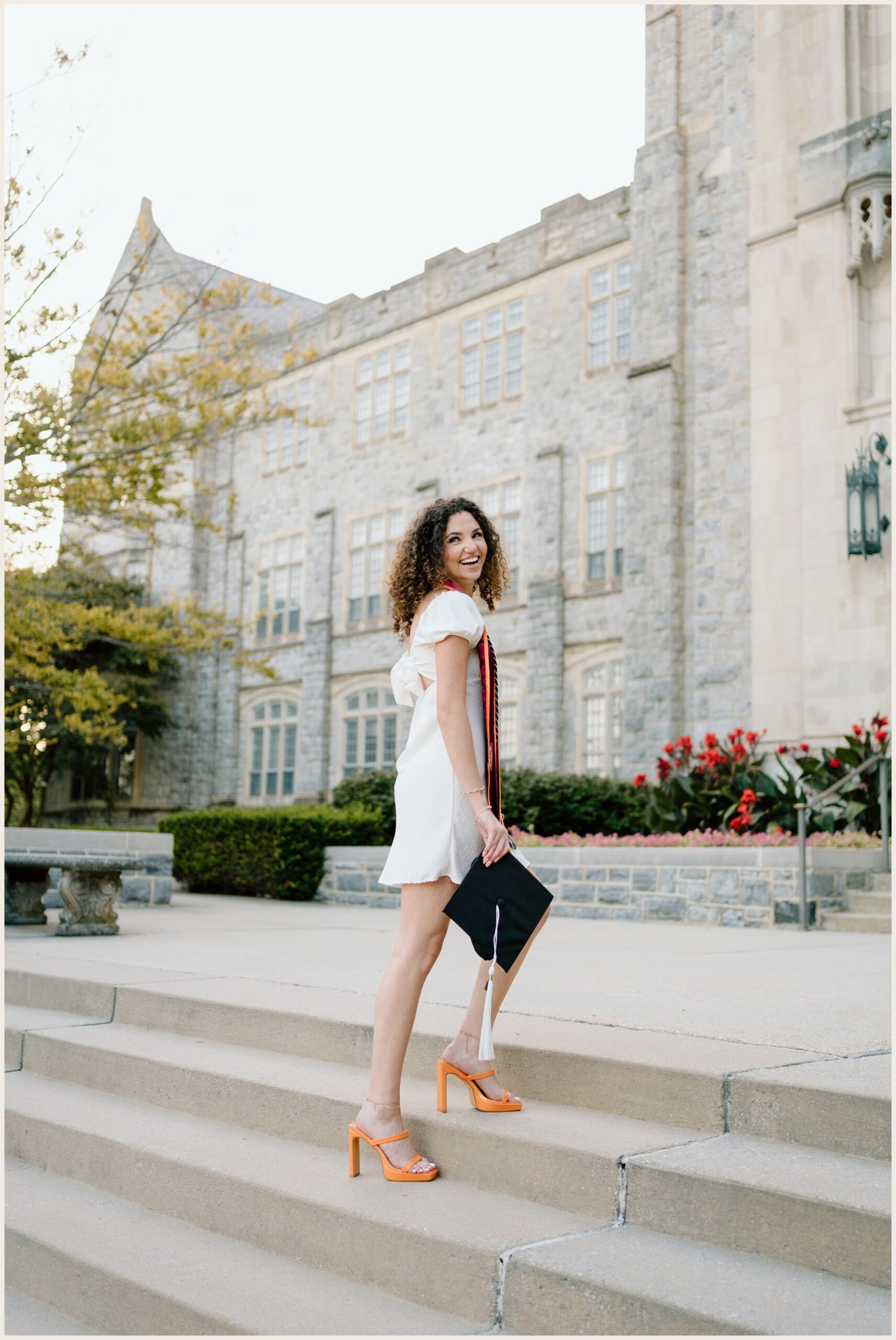 Virginia Tech graduation portrait of a woman at Burruss Hall